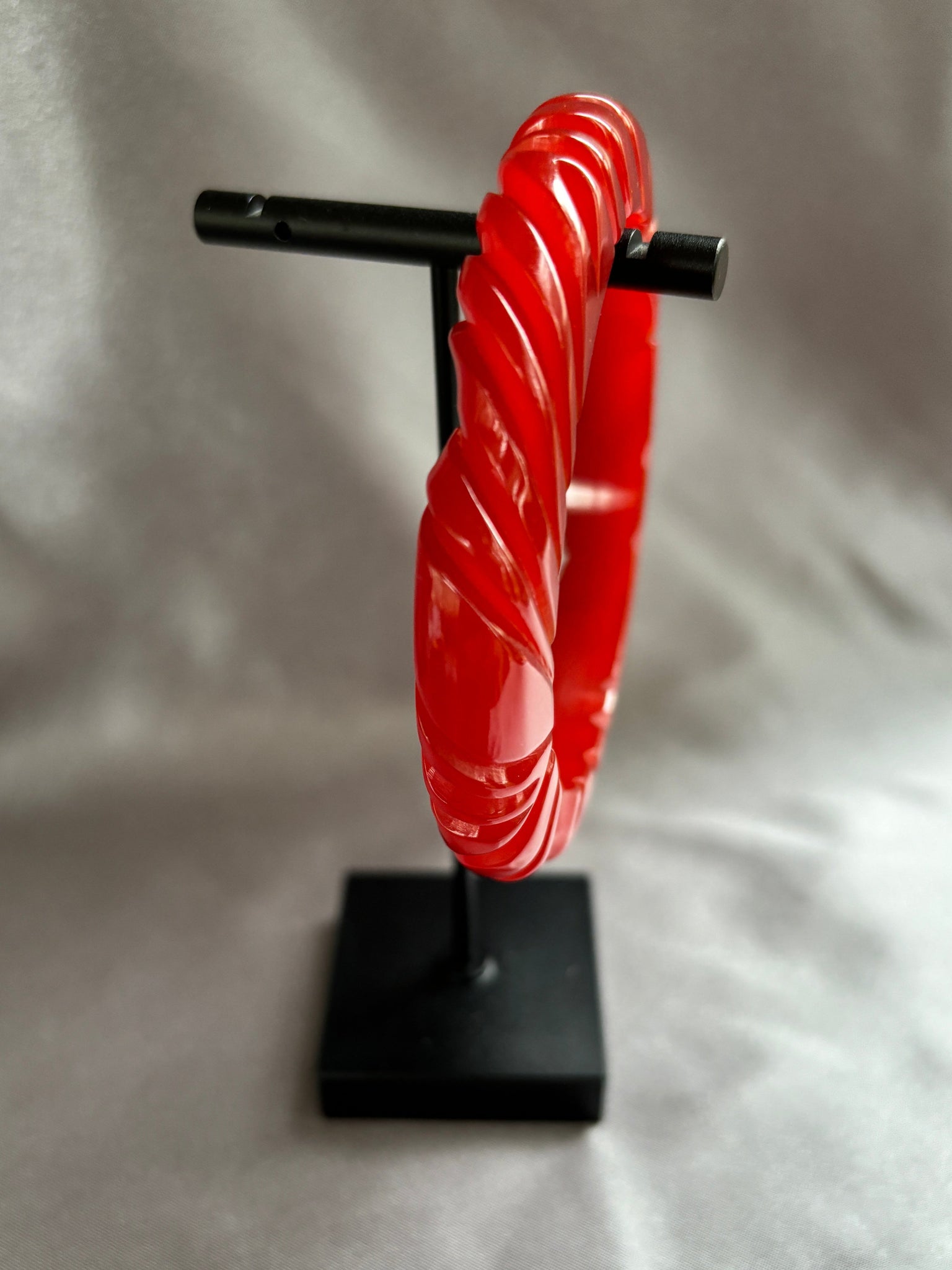 Thin Deep Red Swirl Carved Bakelite Bracelet