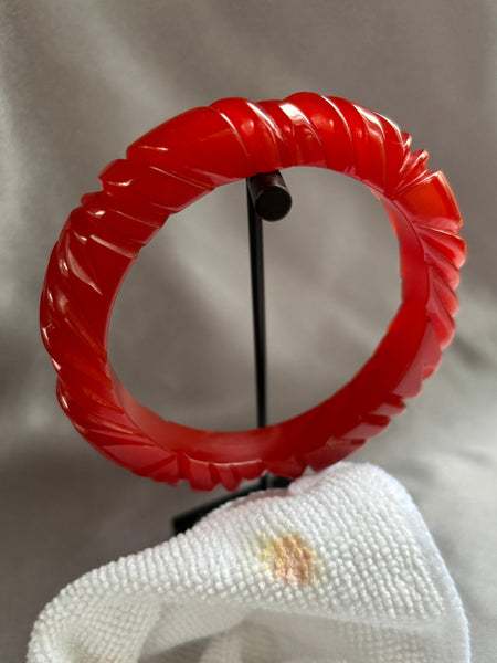 Thin Deep Red Swirl Carved Bakelite Bracelet