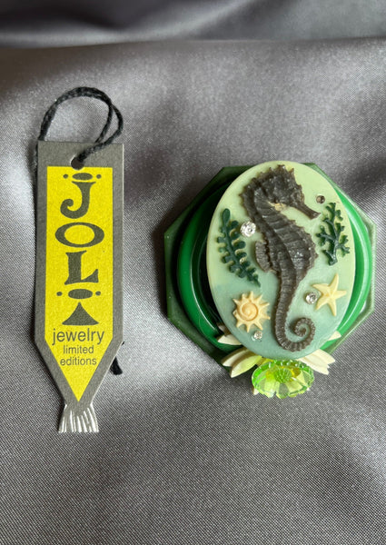 Joli Jewelry Green and Black Seahorse Pin